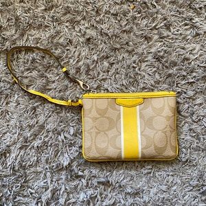 YELLOW COACH LEATHER WRISTLET
